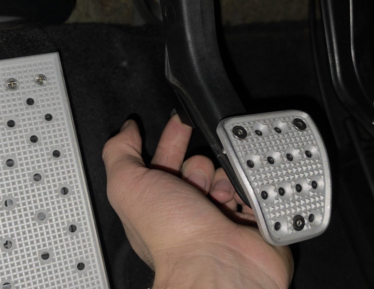 Pressing the clutch stop into place behind the clutch pedal